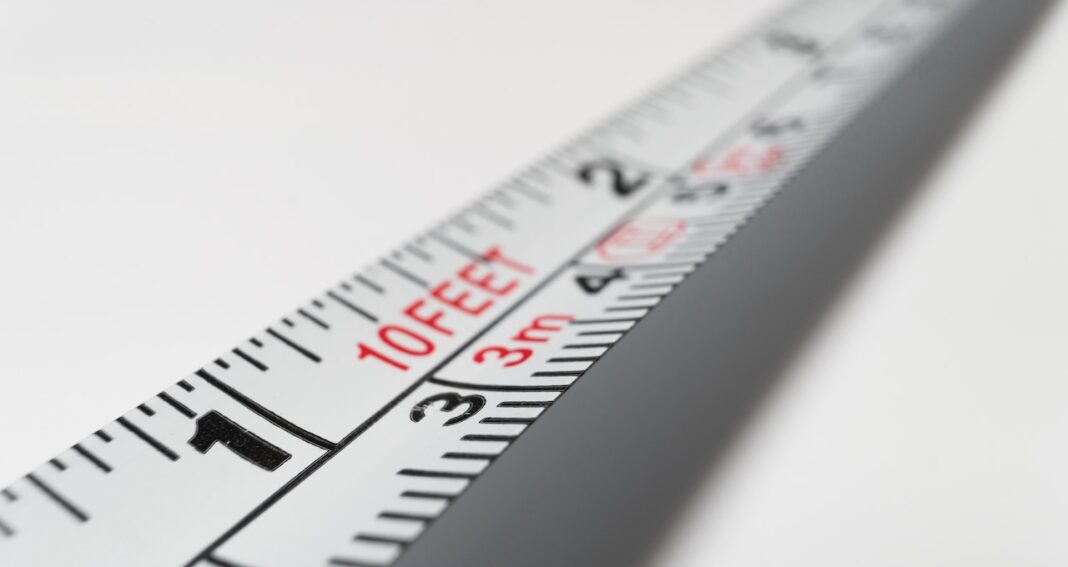 A white tape measure to illustrate how to measure occupational stress