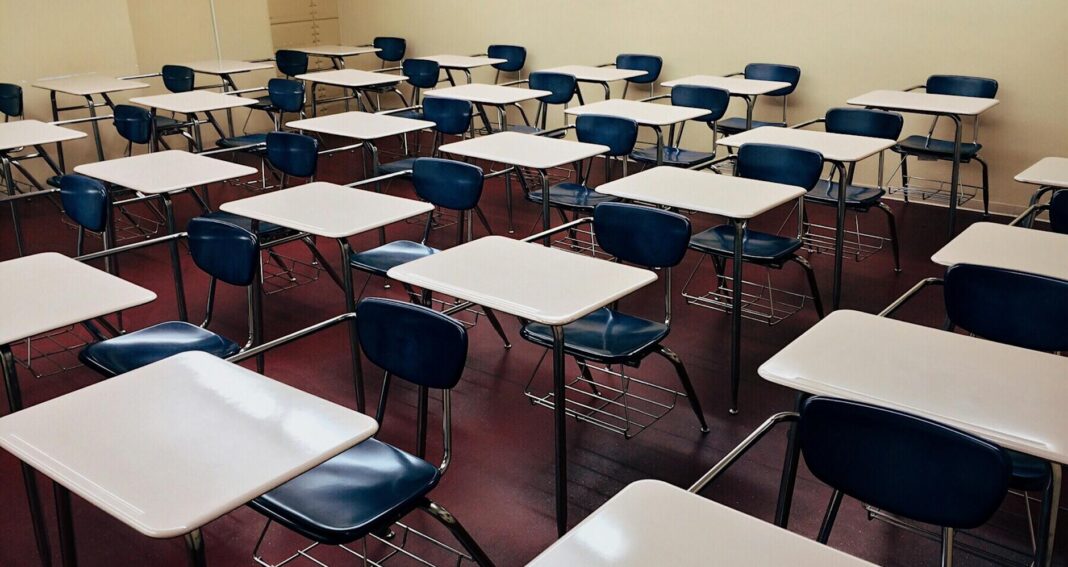 Rows of desks in a school classroom